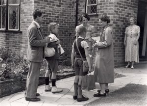 Evacuees being introduced to a prospective family in Brighton
