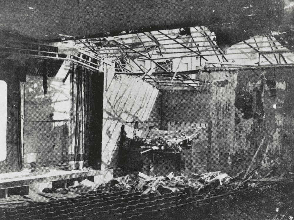 Scene of bombed interior of a cinema. collapsed roof and debris on the floor.